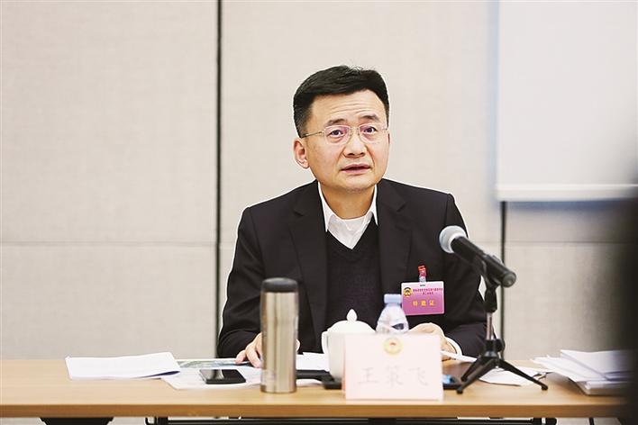 龙岗区委副书记,区长王策飞参加区政协六届三次会议